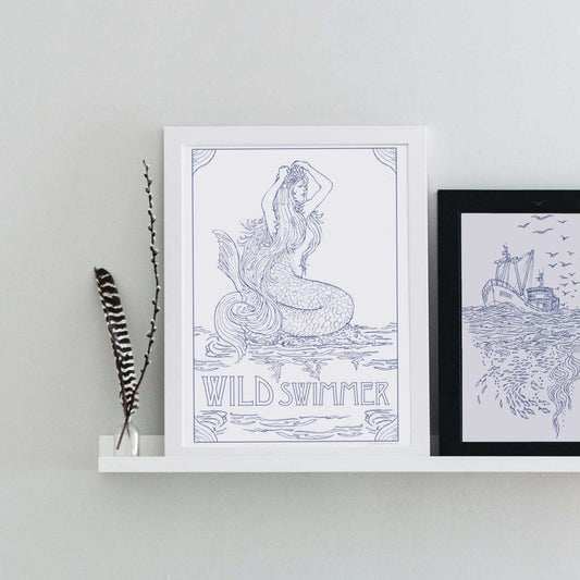 mermaid art print on a wall shelf - gifts for wild swimmers 